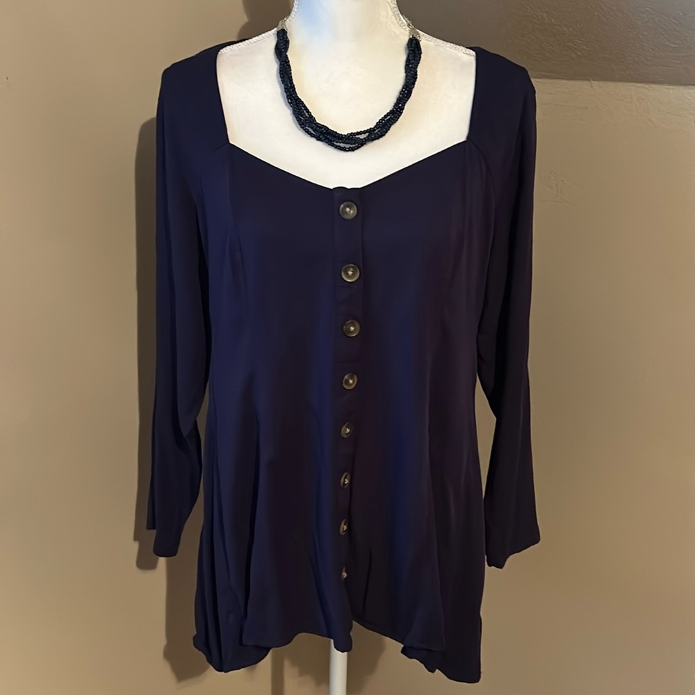 Torrid size 00 button front square neckline with high low hemline.  Navy blue